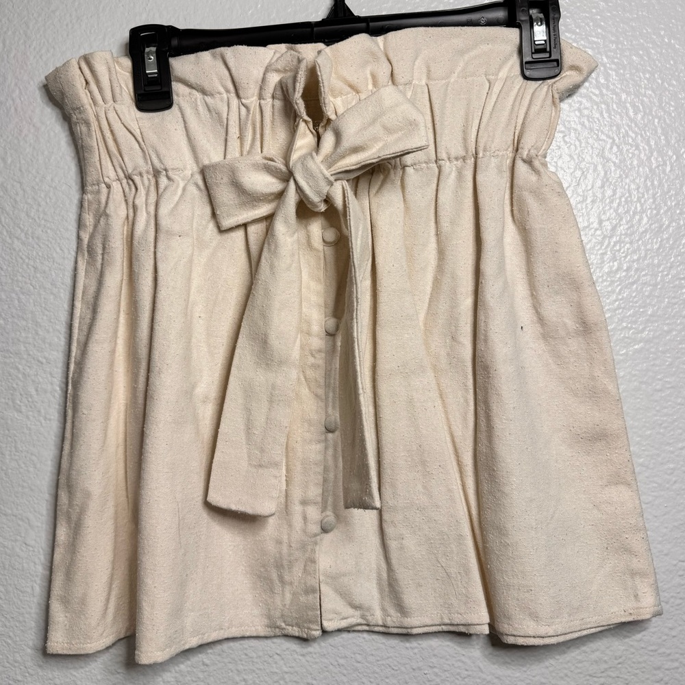 Front tie strapless top